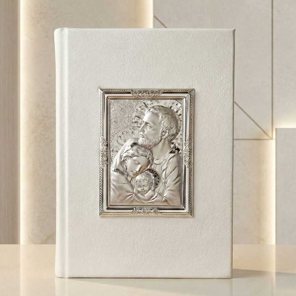 Biblia grande con placa de la sagrada familia elaborada en italia en plata laminada, edición Straubinger.