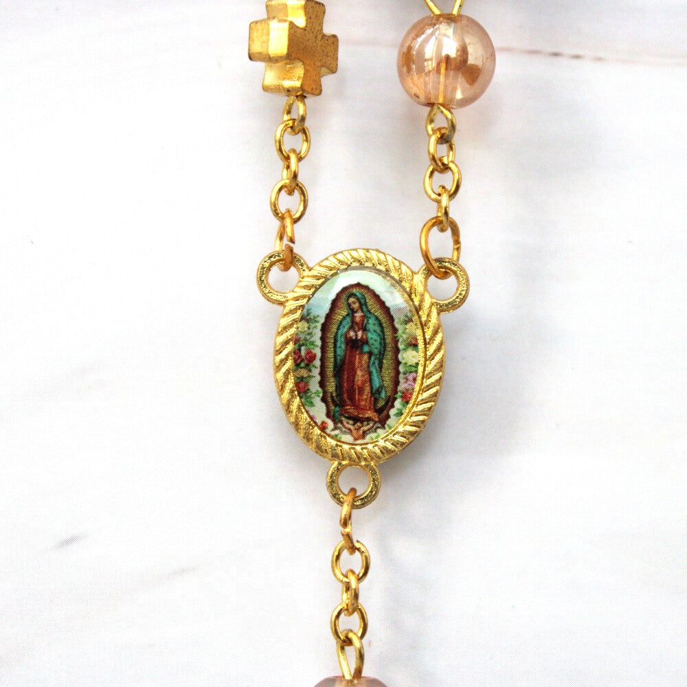 Bolo con decenario dorado, Virgen Maria.