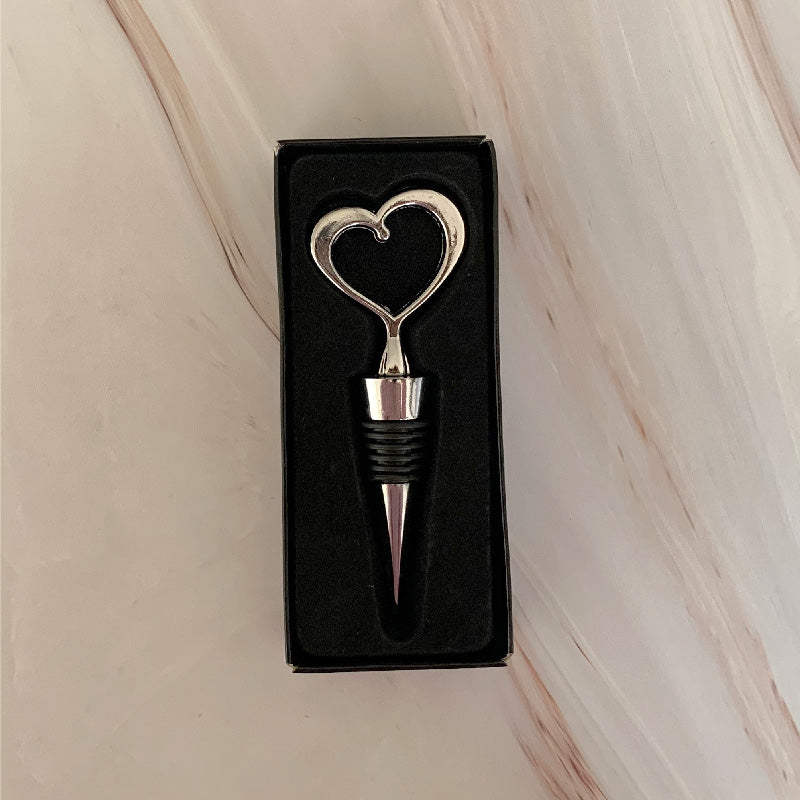 Tapón para botellas con cabeza de corazón.